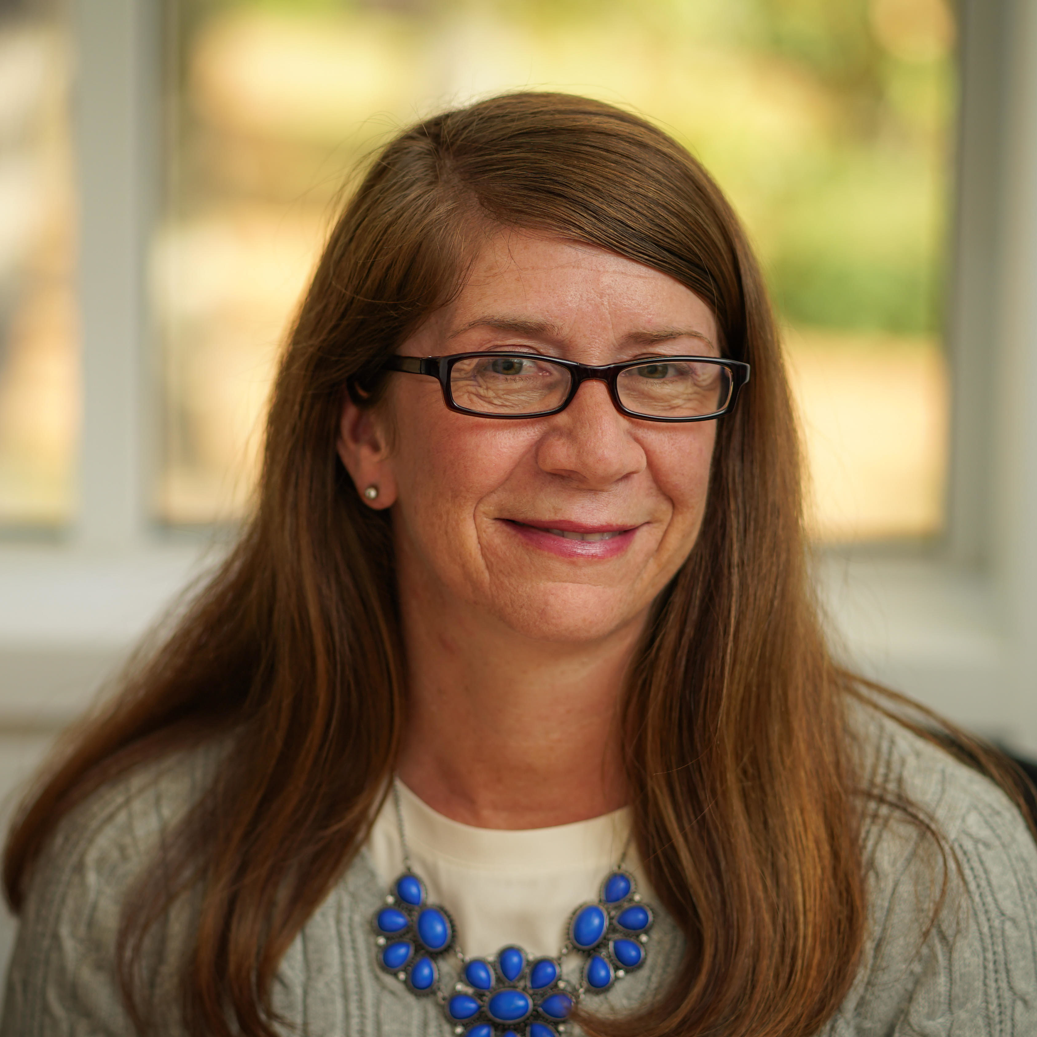 Headshot of Kelly Hennessy.